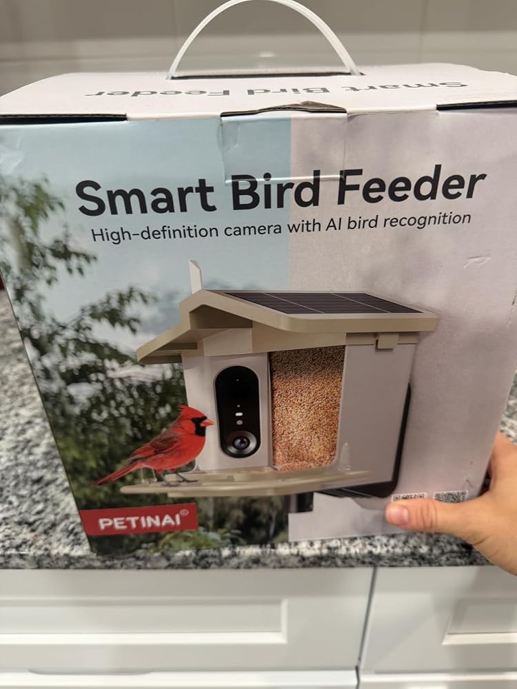 Retail box of the smart bird feeder with the product pictured on the front